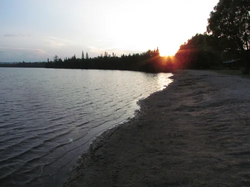 Foster Lake Beach is perfect for a romantic stroll at sunset.