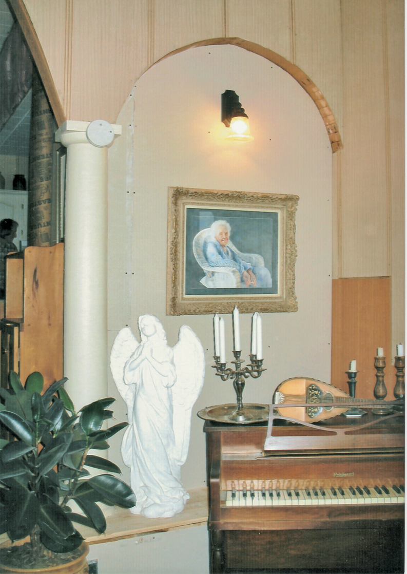 An angel, a piano and other acoustic musical instruments play homage to the years of choir and congregational singing. Photo courtesy Nancy Woodall.