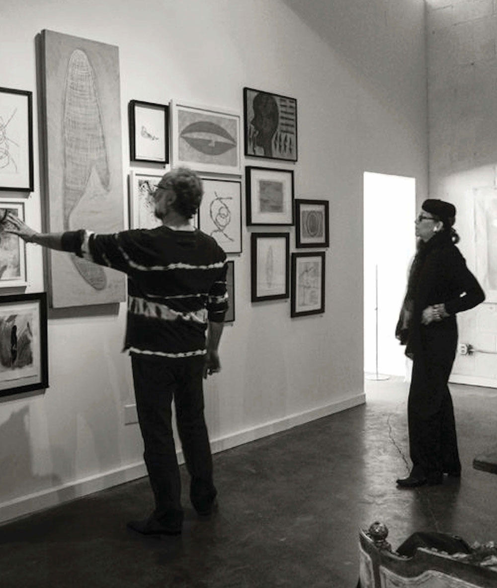 Scott Heidmann with artist Shea Gordon Festoff at the May 2014 Heidmann Art Salon event “Under The Influence,” exhibiting works by Gordon Festoff PHOTO: Pilar Law