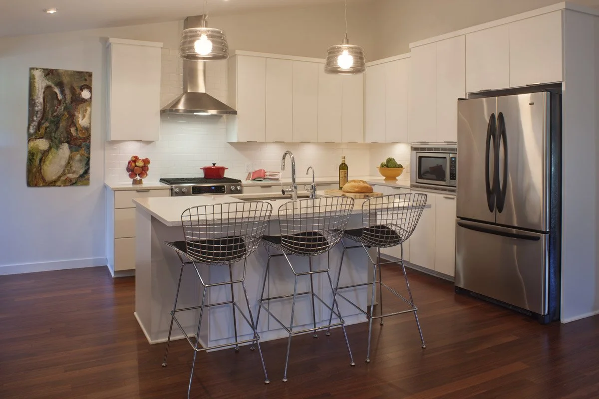  Our clients were a growing family in need of more space, a better functioning kitchen and more privacy for mom and dad.  