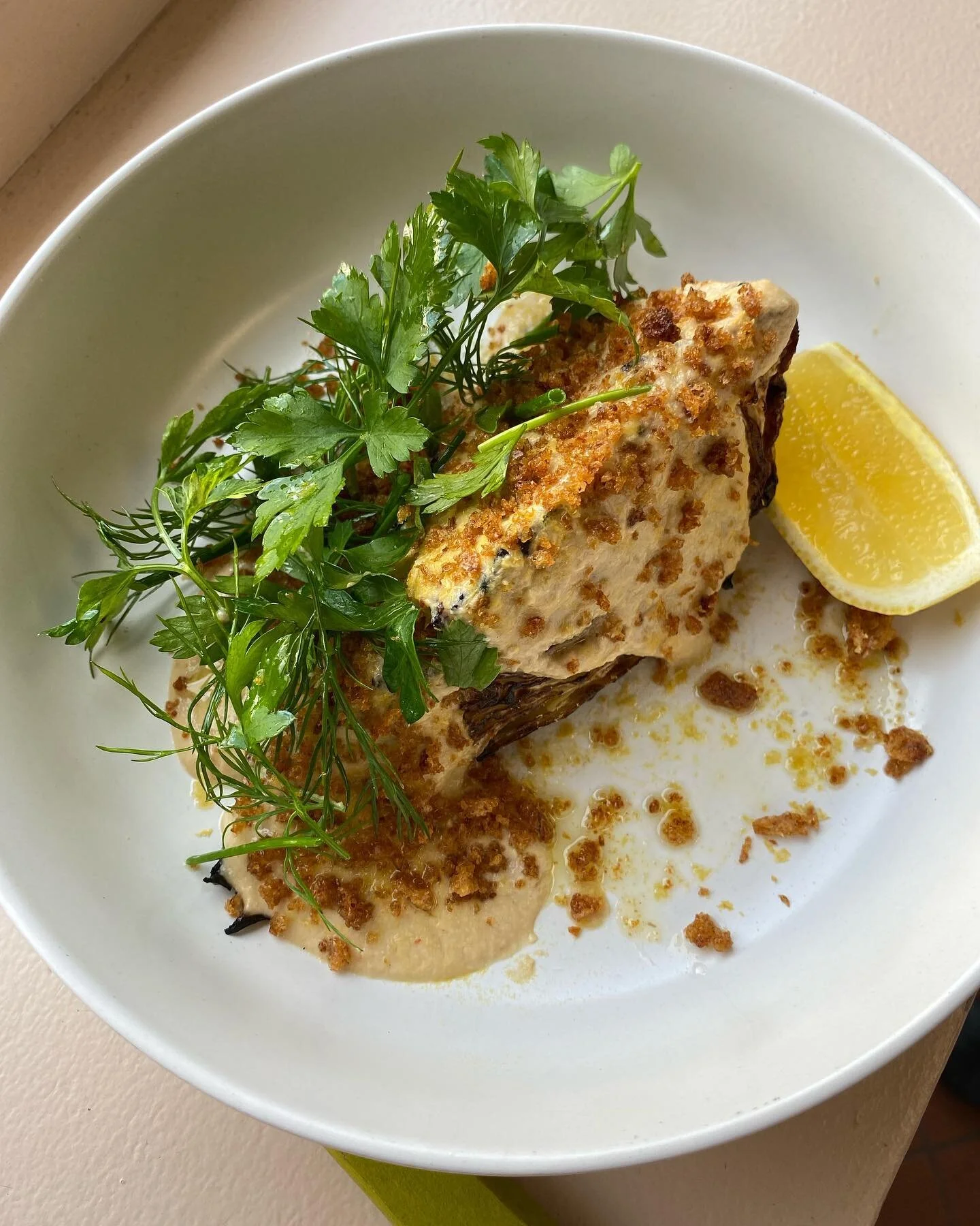 Caraflex Cabbage with tahini, anchovy, bread crumb and an herb salad.