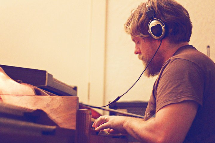 Cowboy Mustache owner, Dave Matthies, lays down some organ for a film score. photo by Unscripted Photos