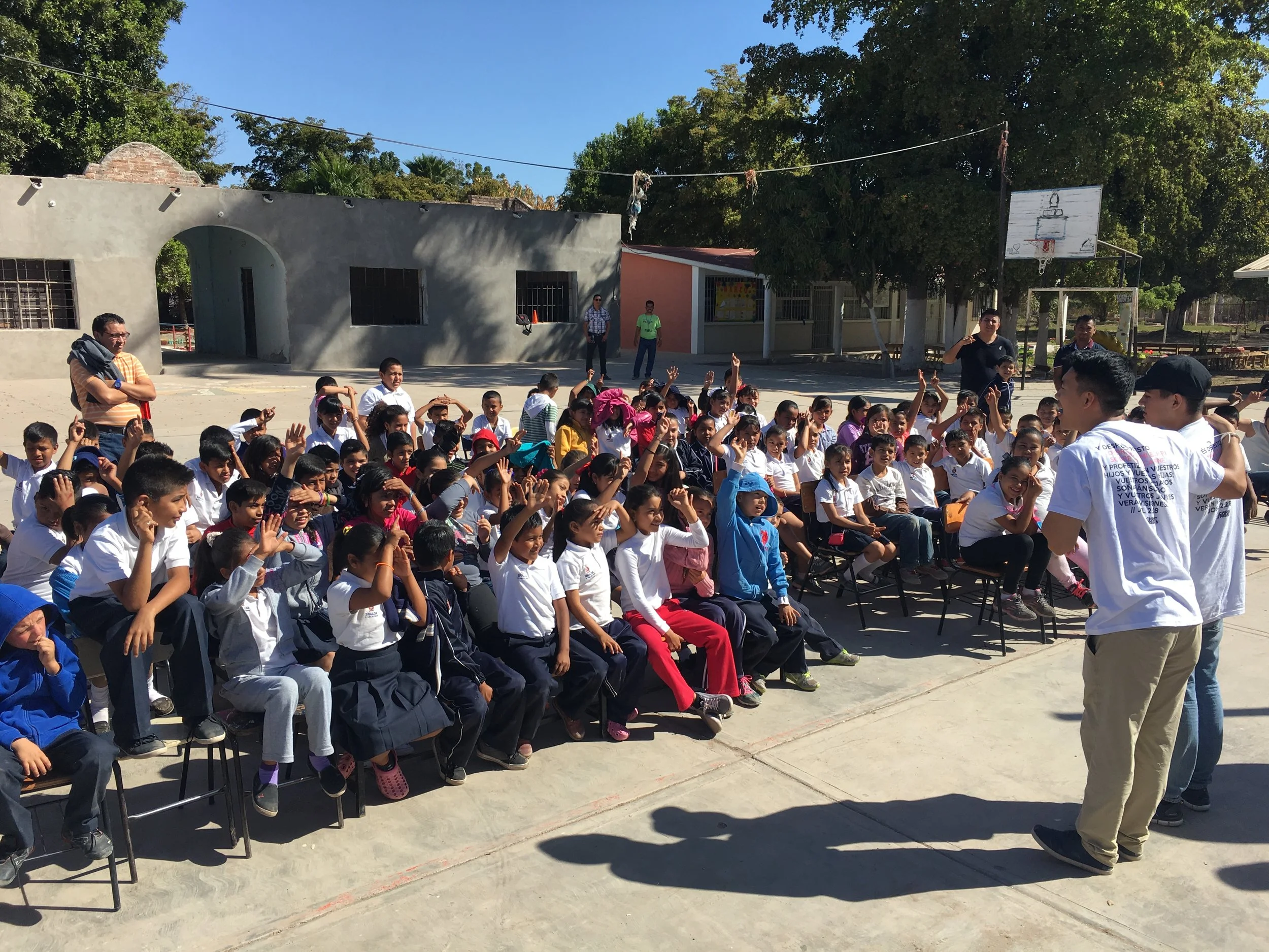 Preaching the gospel to an elementary school in Teroque 