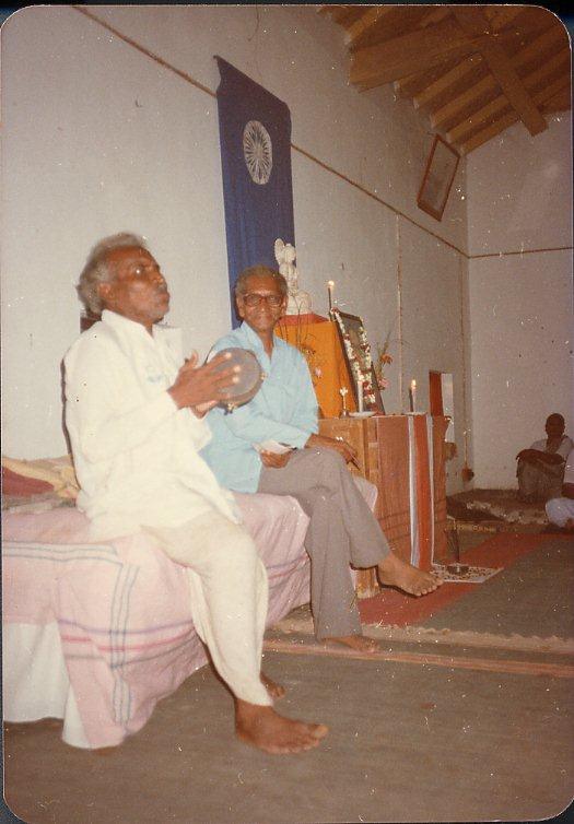 This was at a big rest house in Sevagram, Gandhi’s main ashram near Wardha. The workers in the ashram were all local Buddhists who lived down the road and they got terrible pay there from the government. They were all complaining aboutbeing treated very badly. We had a retreat there for about 300 people in ’83. And so the man playing this drum had been a sort-of Hindu holy man from the Dalit community before he converted to Buddhism. A lot of grassroots level holy men play music, especially in Vidarbha, I imagine all over Maharashtra. He was known for his singing and beating of his drum so he came on our retreat and got quite involved with us. He was quite a character; really able to stir people up through his music. The person next to him was actually the person who introduced me to him, Sanghasena. He was from Vidarbha, and Buddhists there specially have a strength and an energy that you don’t get anywhere else in Maharashtra. He had been a Bidi worker, the little cheap cigarettes you get. After he met us, he spent all his time touring villages and organizing tours and retreats for us. He could really rouse people with his speeches.