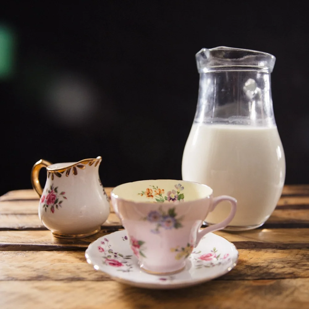 Jug of Mossgiel Milk from Ayrshire with vintage china milk jug and a vintage china teacup and saucer. 