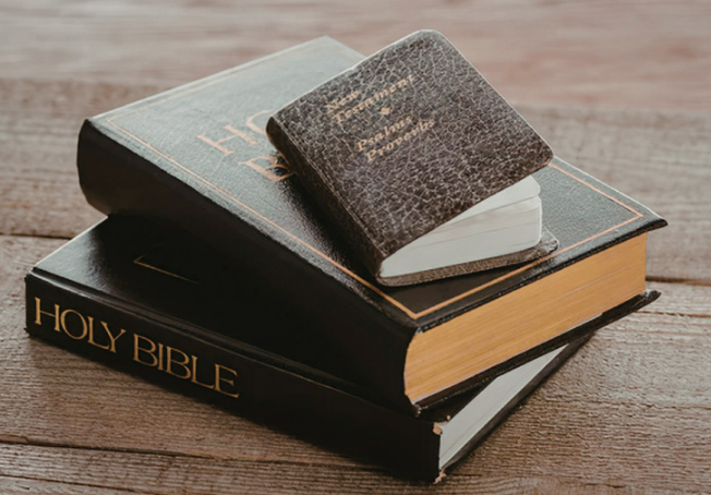 Pile of Bibles.png