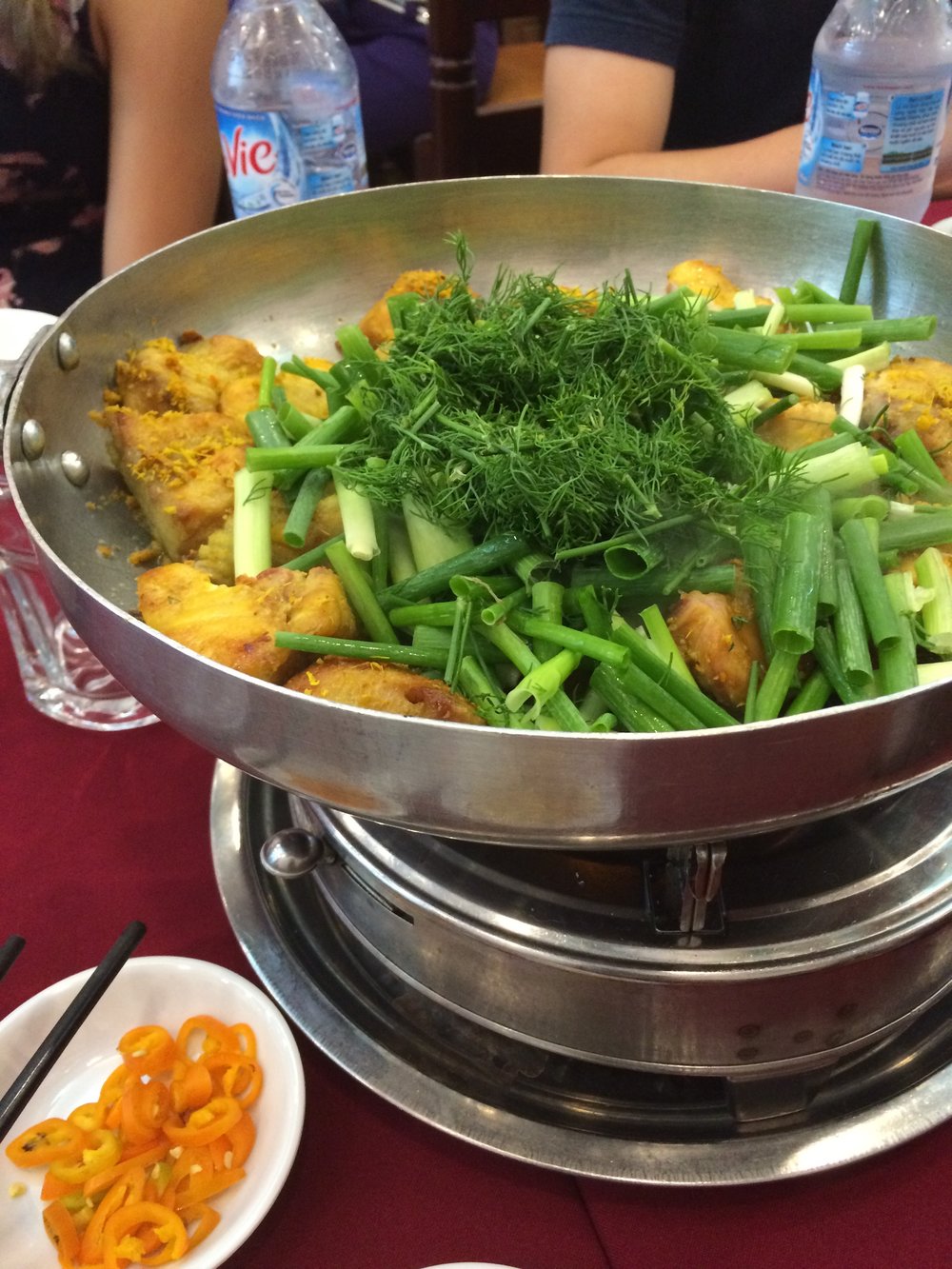 Catfish with tumeric and dill cooked in front of us in Hanoi