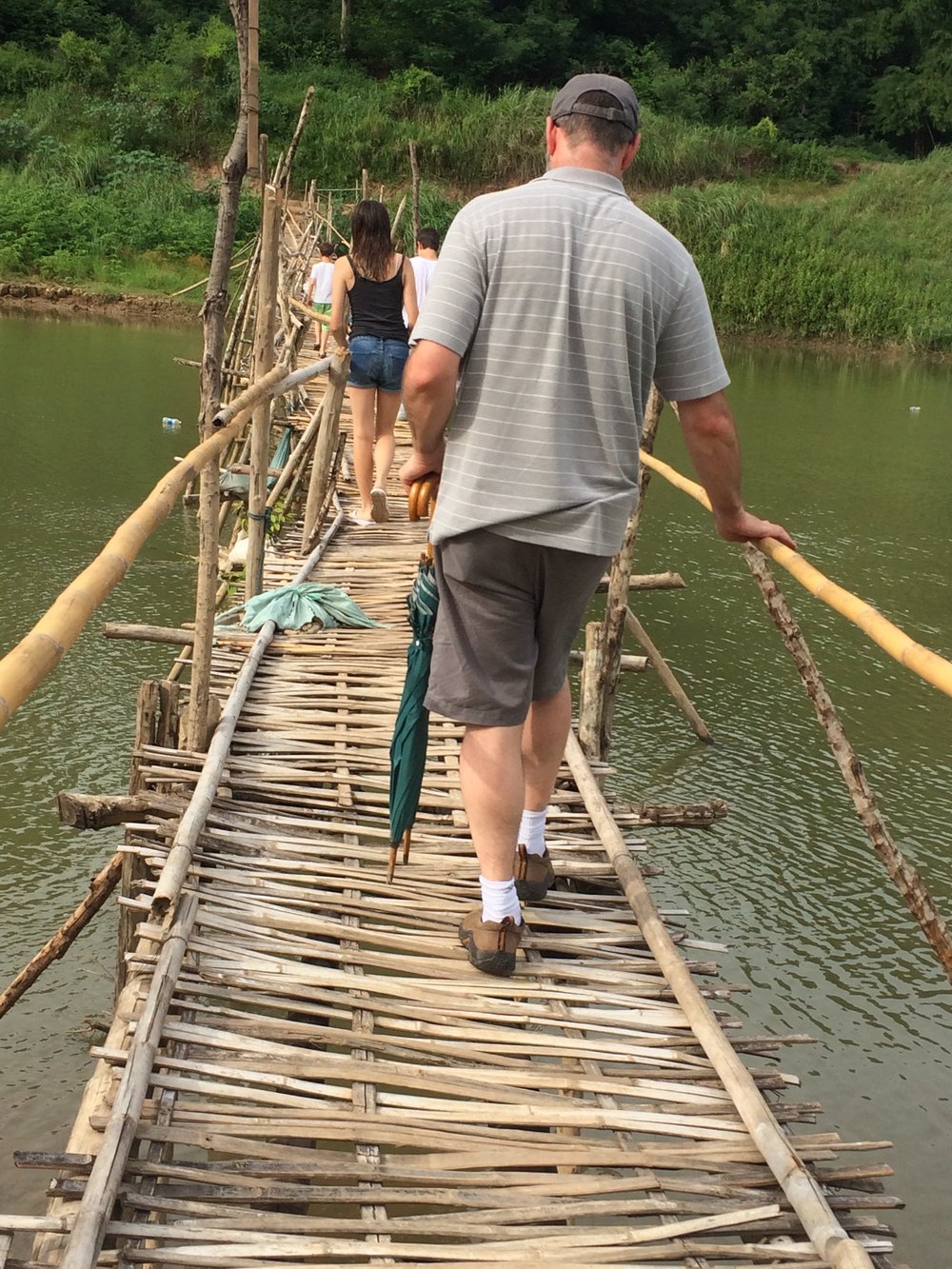Villagers build this bridge, Mekong knocks it down, they build it again. 