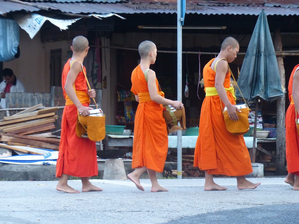 Monks accepting alms.