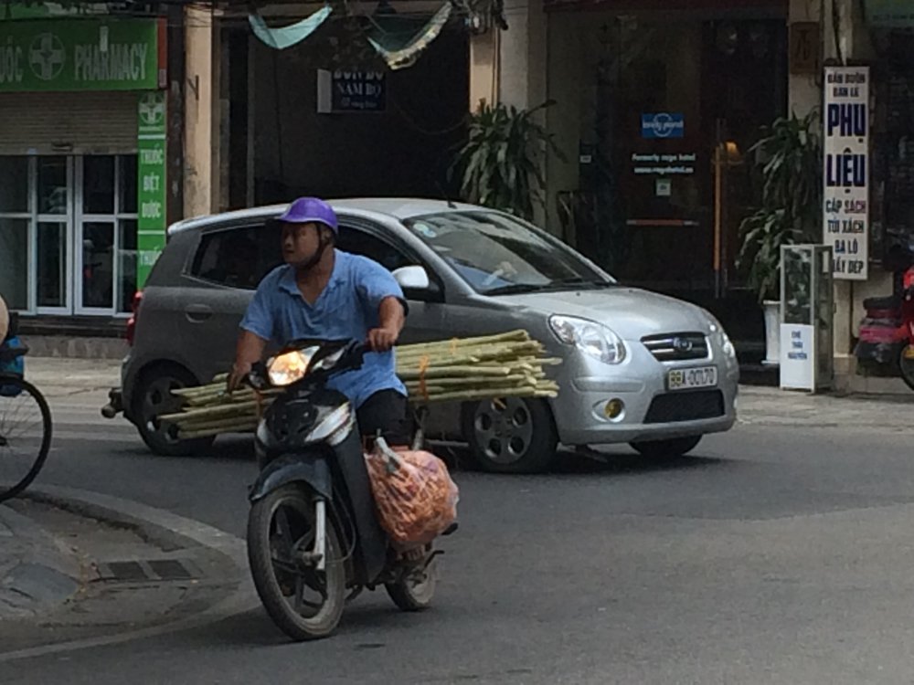 What is the oddest thing one can carry on a scooter?
