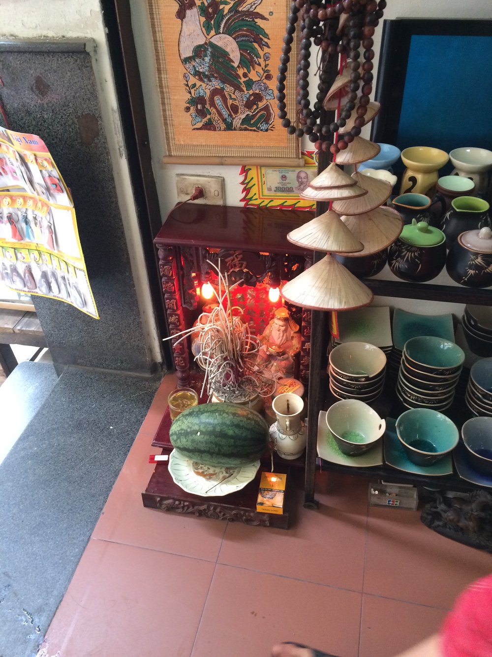 Why are these shrines in every Vietnamese home and business?