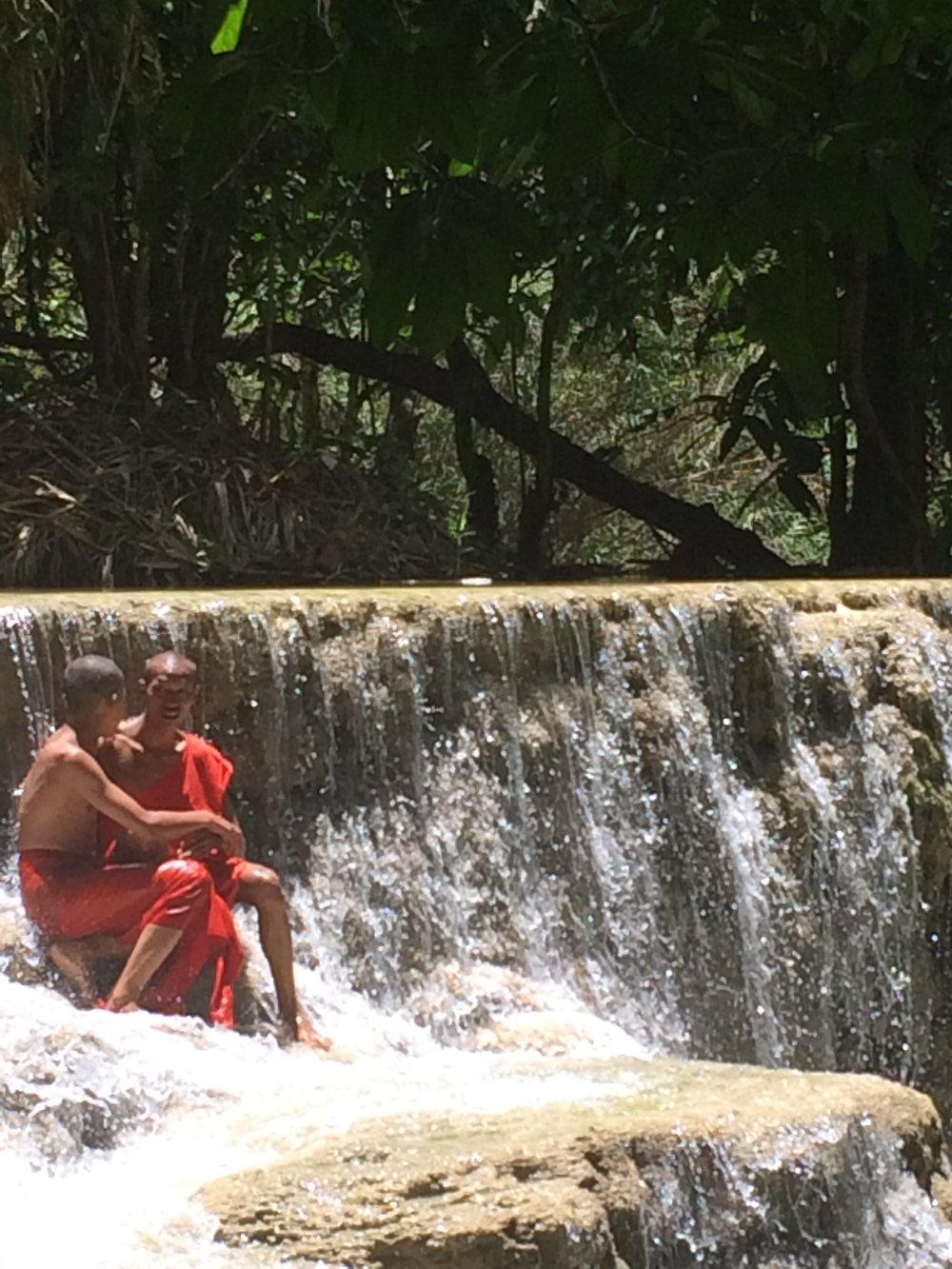 Monks at the Luang Prabang falls.