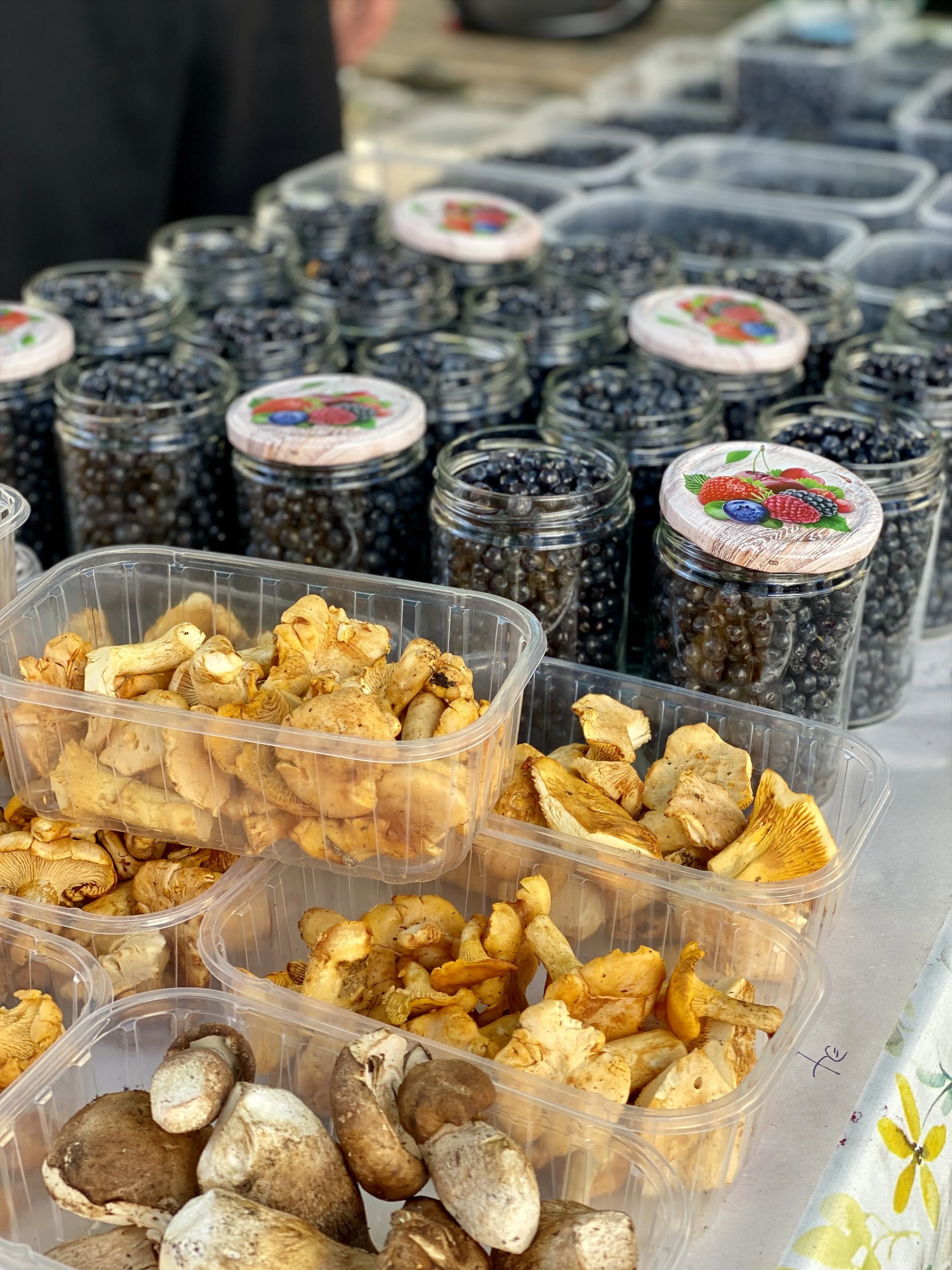 mushrooms and berries for sale at Ljubljana's market in Slovenia