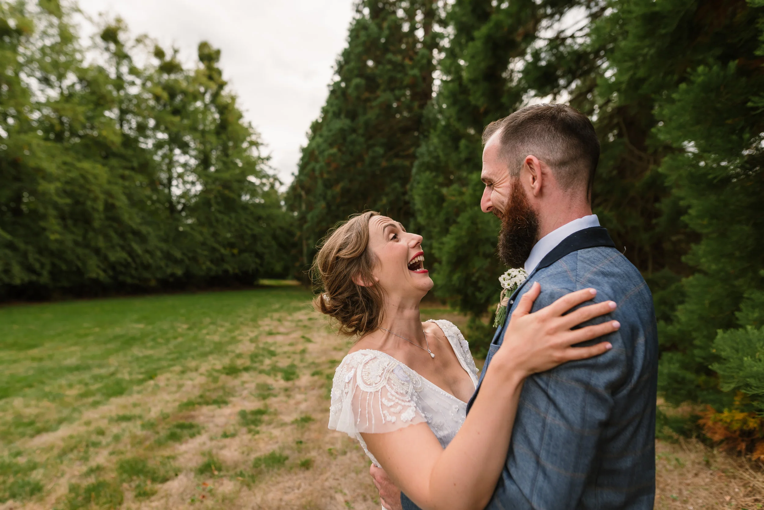 bride-and-groom-laughing / Hampshire-wedding-photographer / fleet-wedding-photographer / farnbrough-wedding-photographer / Sarah-fishlock-photography