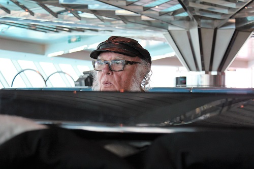 Focus frontman/flautist Thijs van Leer whistling while playing the piano