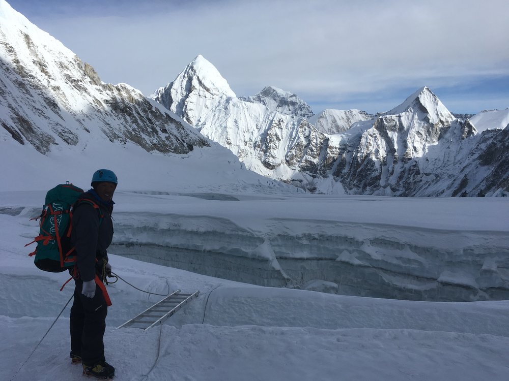 Descending the Western Cwm toward Camp 1 with (L to R) Pumo Ri, Cho Oyu, and Lingtren in the back