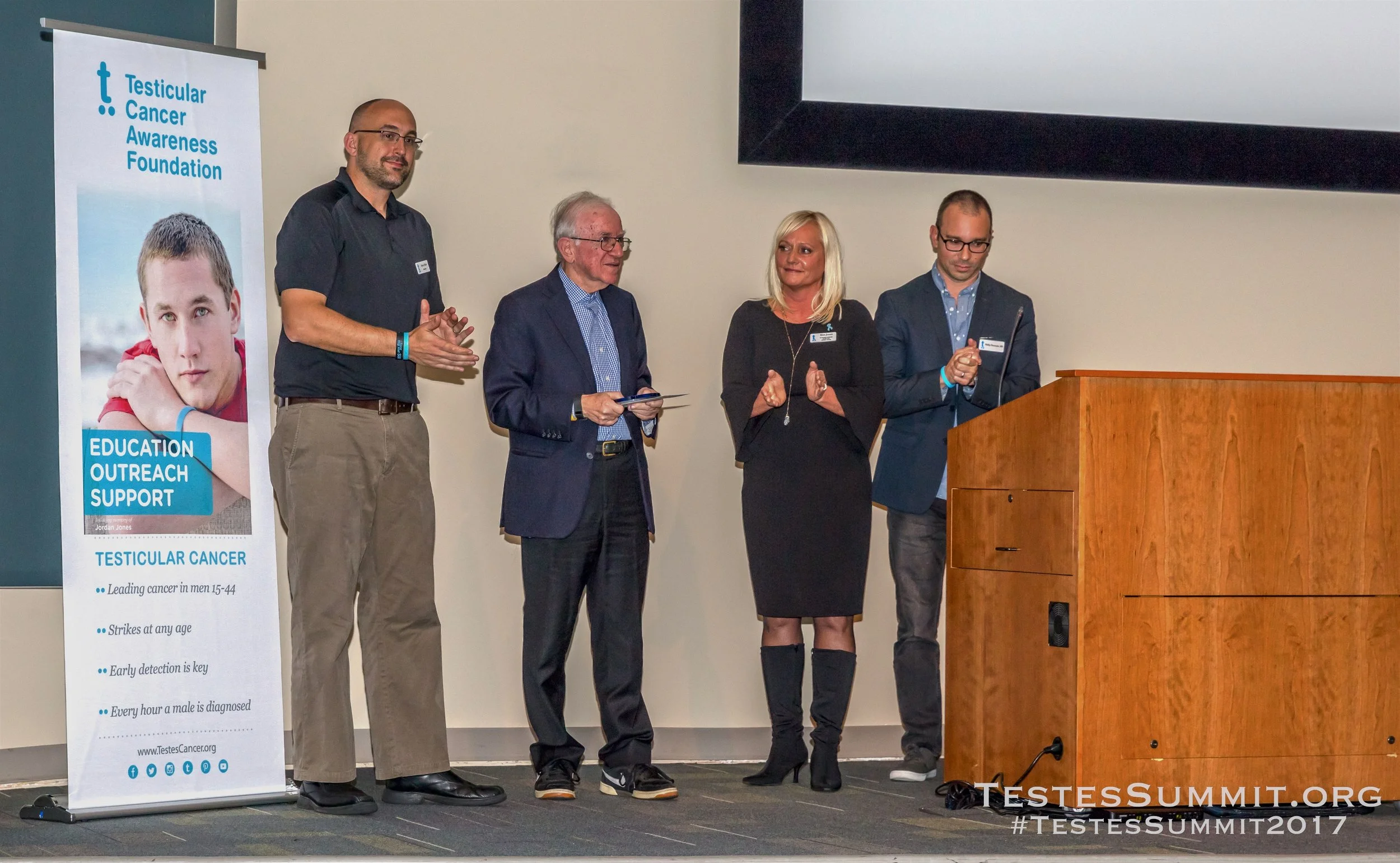 TestesSummit Owner/Co-Founder and Chair, Steve Pake, with Dr Lawrence Einhorn, Kim Jones, CEO of TCAF and primary sponsor and fiduciary for the event, and Dr. Phil Pierorazio, at the 2017 Testicular Cancer Summit.