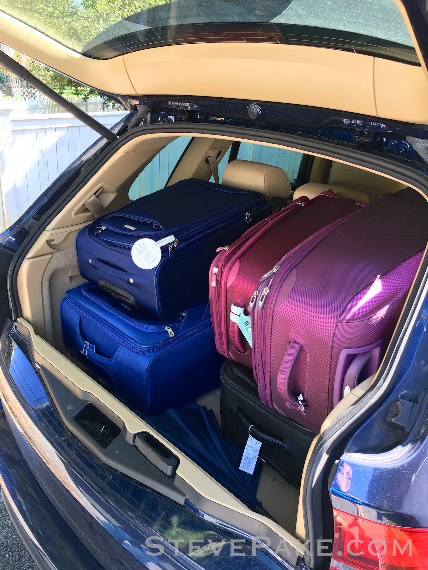Our 2012 BMW X5 with the same five international trip rigid bags, with room to spare for all the extras!
