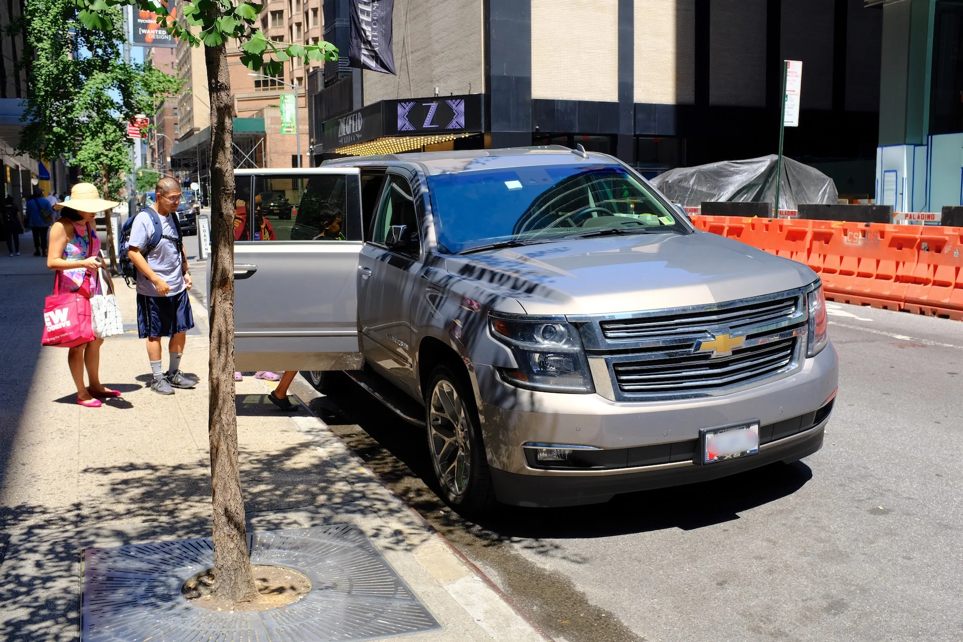 Hopping out of the Suburban in NYC. I still haven’t posted photos from our NYC road trip over July 4th weekend, work has been too busy and we’ve been prepping our basement for renovation.
