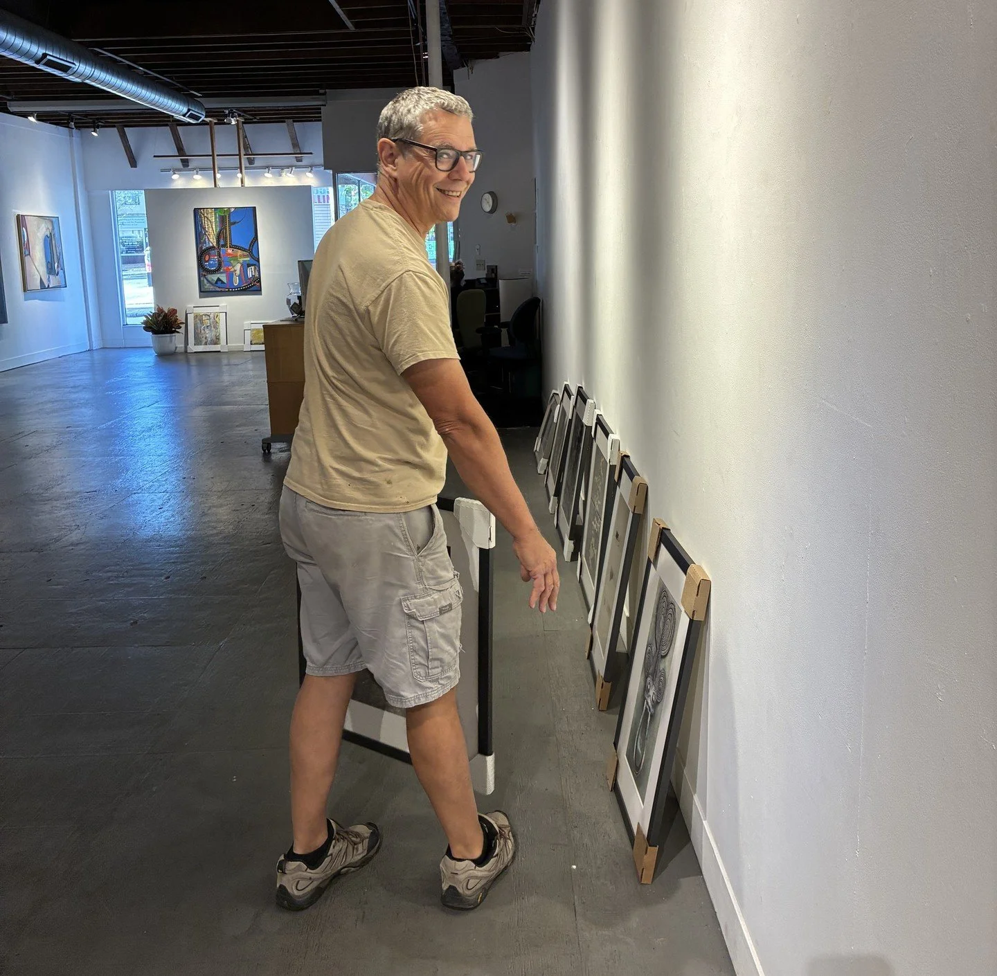 The gallery is brimming with energy as we prepare for the upcoming show! With many tasks ahead, the excitement of transforming the space is truly contagious. Numerous members are contributing to the work required. The exhibiting artists, William and 