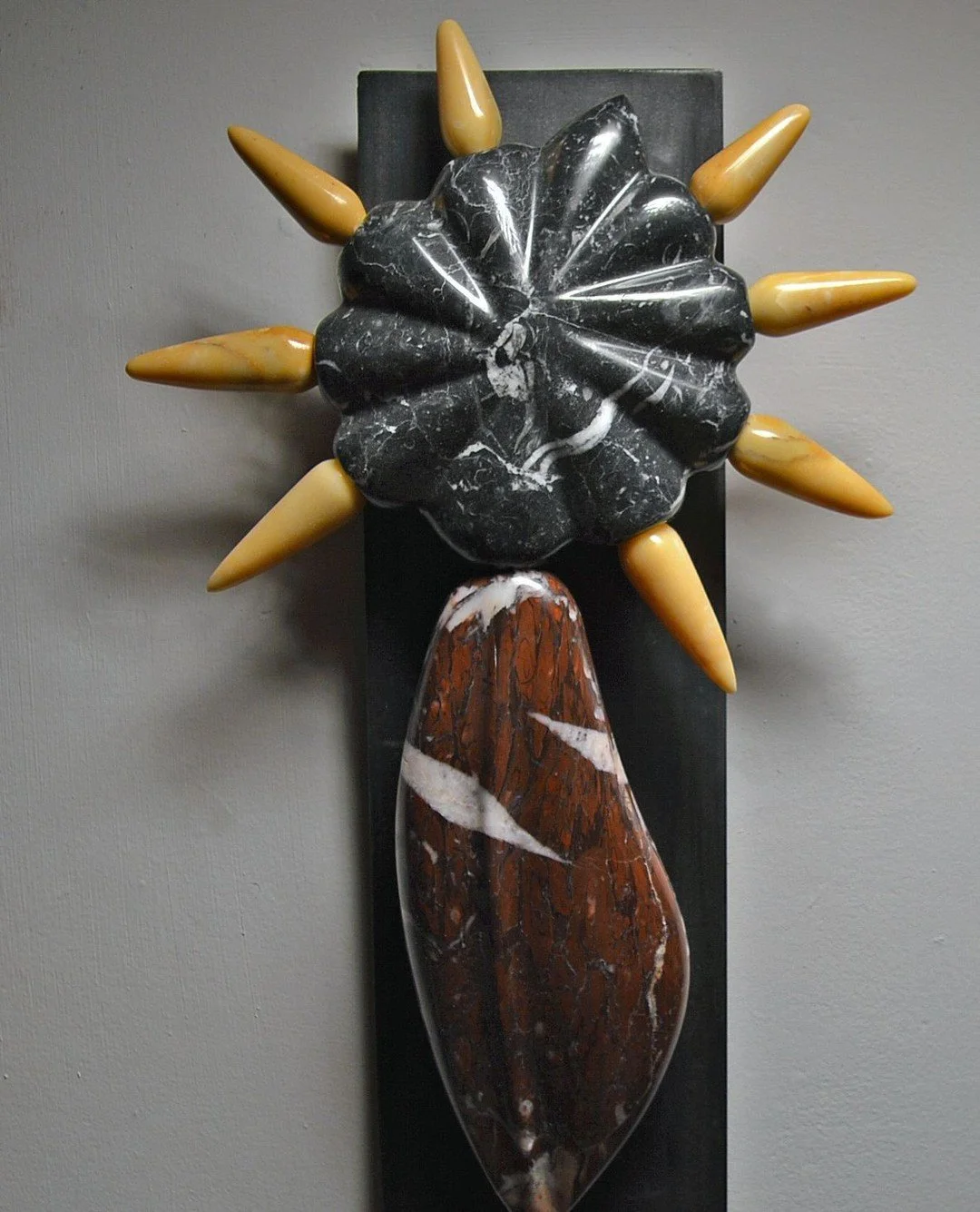 The stone in @garwaterman sculptures come with intriguing origin stories! In this case,  Zoochorous Seed,  it is of a Western European descent.⁠
⁠
Yellow marble:  from a quarry in Siena, Italy and fun fact: many of Spain's churches are built with it.