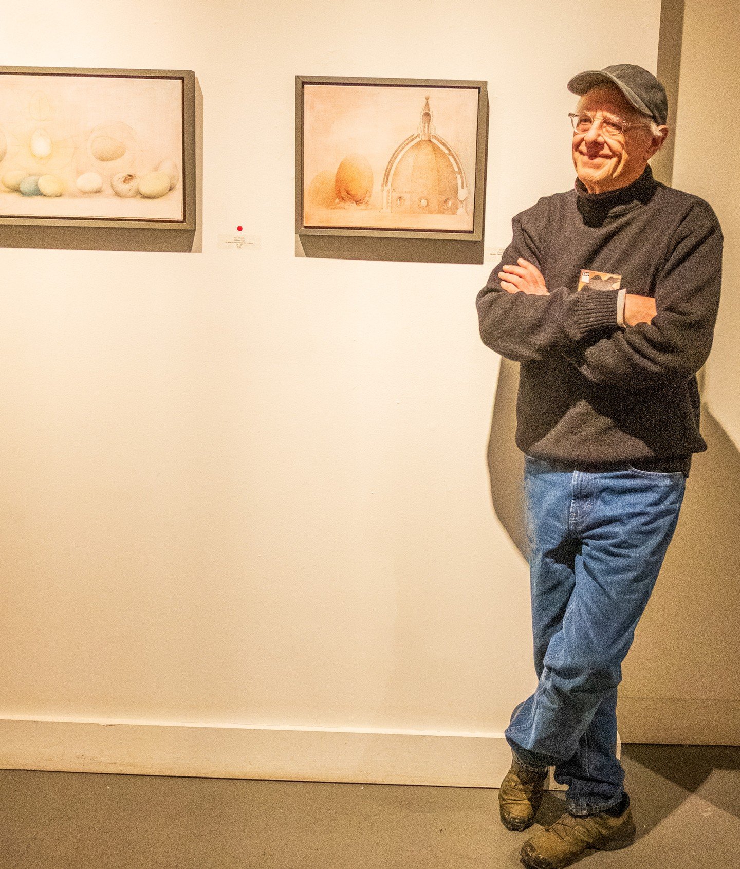 Tom Edwards stands before 2 pieces from BIRD, Edward's so called exhibit, now in the gallery until March 15!  Read the review below or better yet, join us in person.⁠
⁠
Gallery hours: Fri-Sunday 12-5pm.⁠
⁠
https://midbrow.org/tom-edwards-gar-waterman