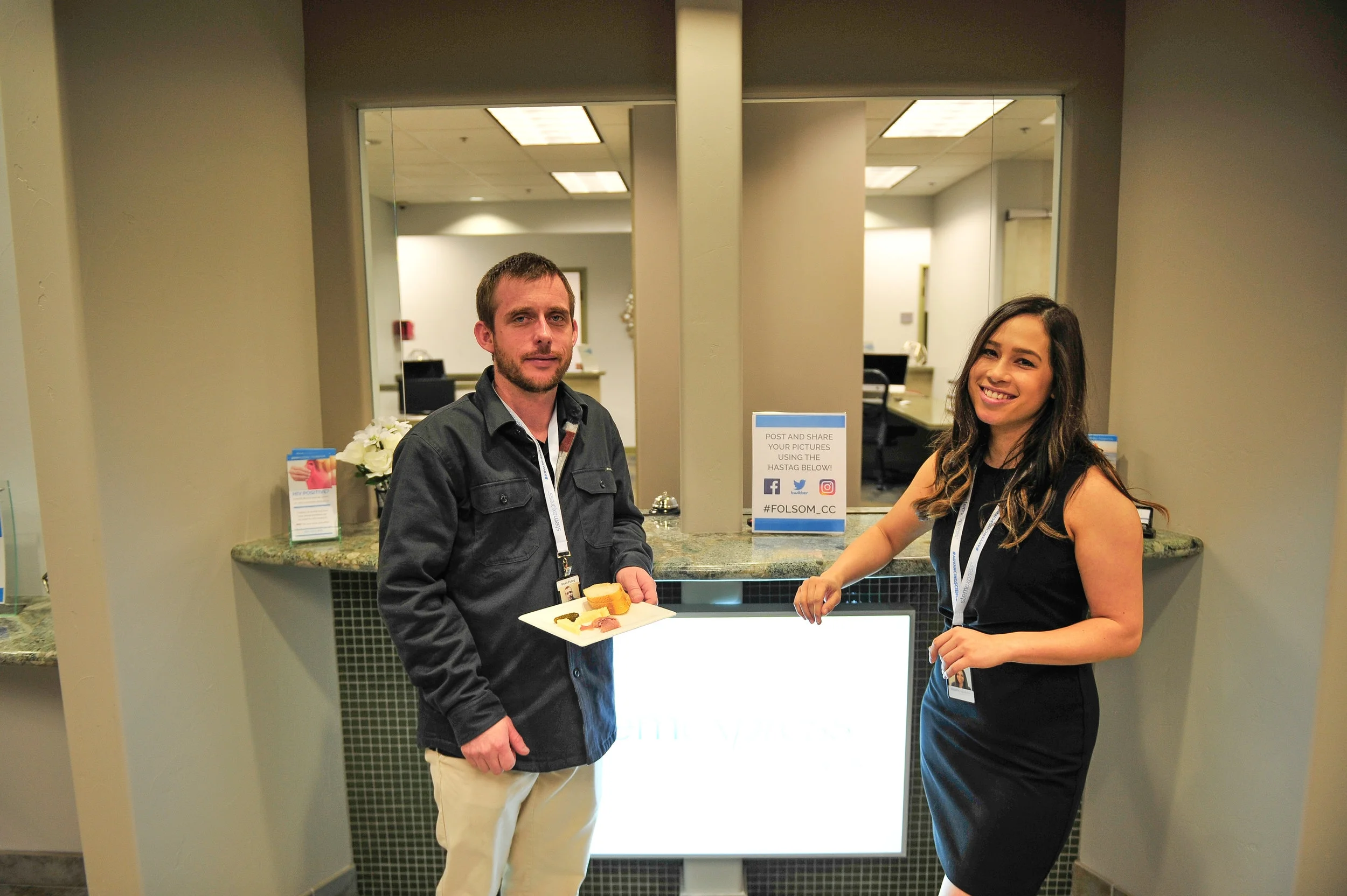 Staff greeting guests in the lobby.