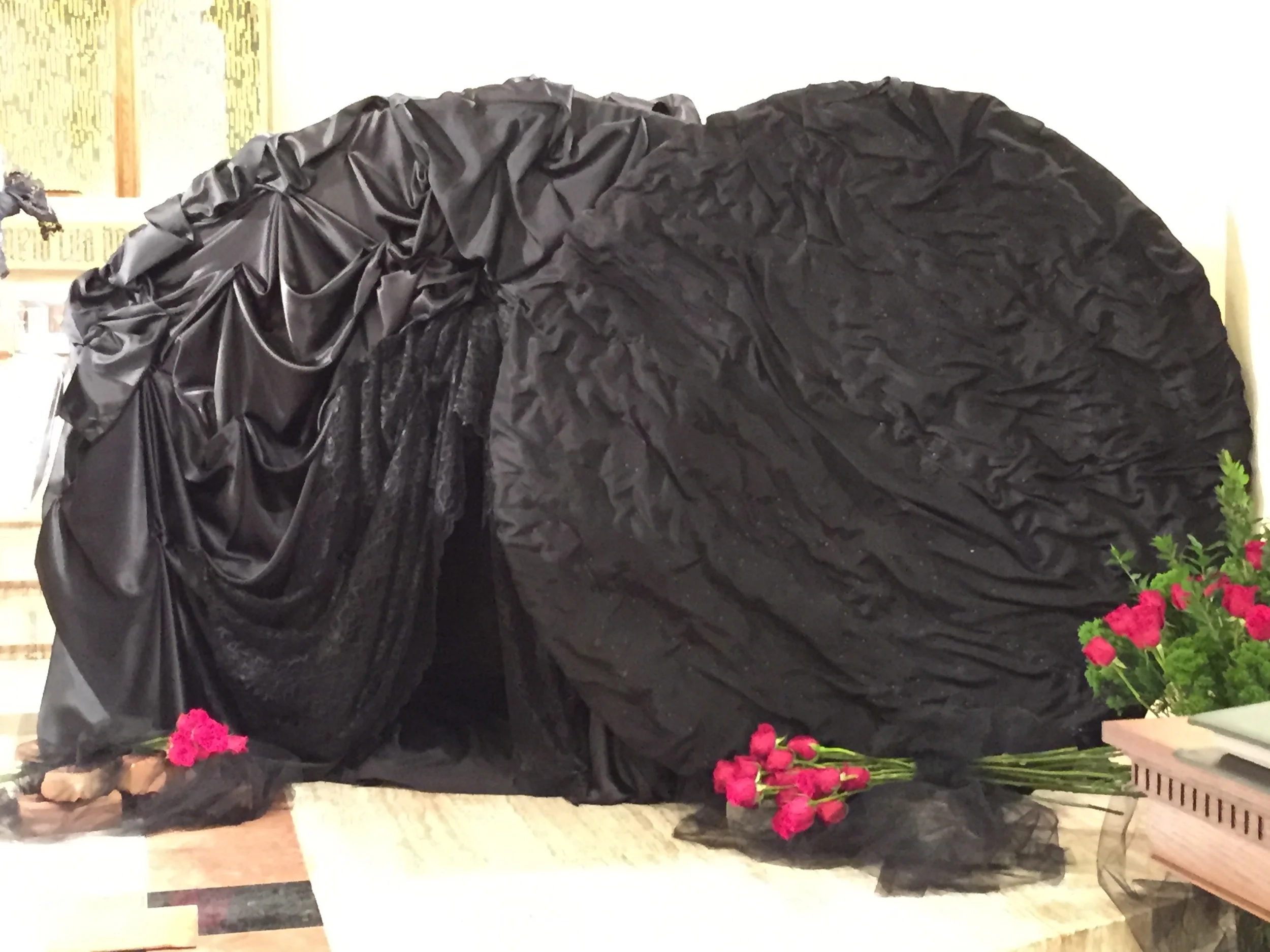  Representation of the "Tomb of Jesus" with the "Rolling Stone." Effect created by the draping of different texture/sheens of fabrics 