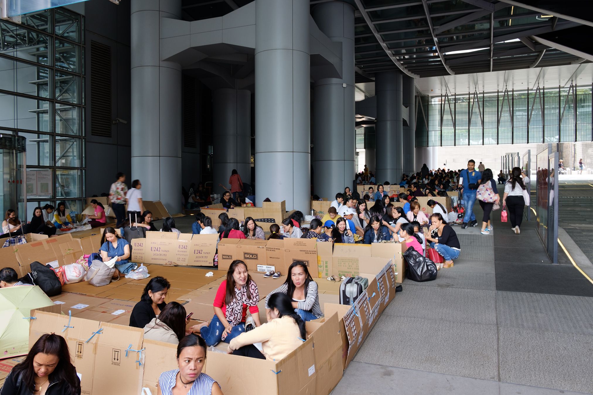  Every Sunday parks in Hong Kong are flooded by Philippino women, who are working as domestic workers. They are living with the families and have thus no places to meet, so they gather outside in the parks 