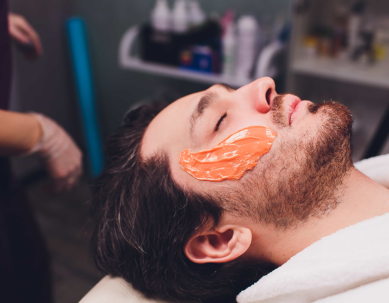 Back waxing service for men using professional techniques to remove hair smoothly and evenly in Buena Park