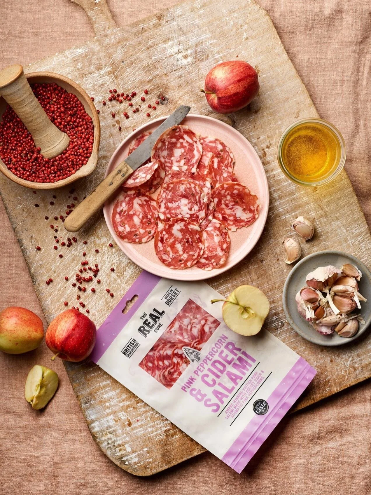 Our aromatic Pink Peppercorn &amp; Cider Salami made from floral pink peppercorn and cider from the Isle of Purbeck. We visited @purbeckcidercompany a few seasons ago during their apple harvest and it was a brilliant sight to see, turning fruits from