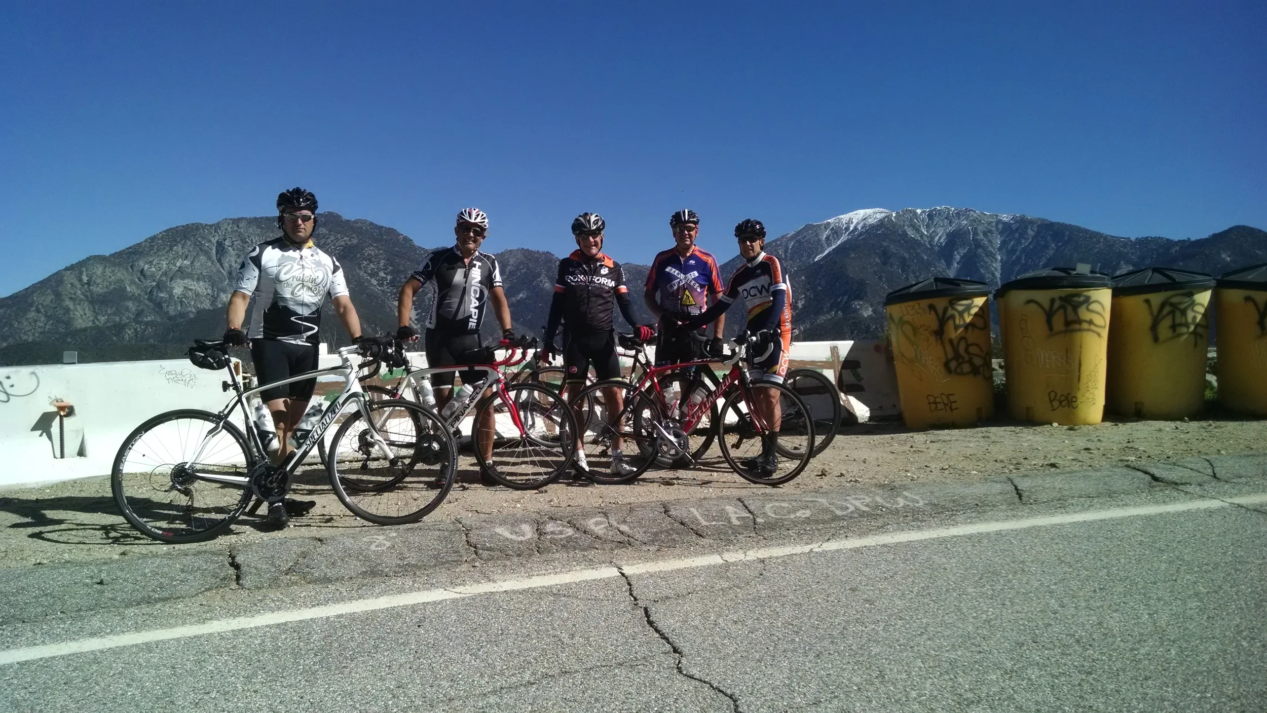 Sean, Vic and BCI members Vince Wilhelm, Jim Norman and Bruce Campbell taking a break in front of Mt. Baldy.