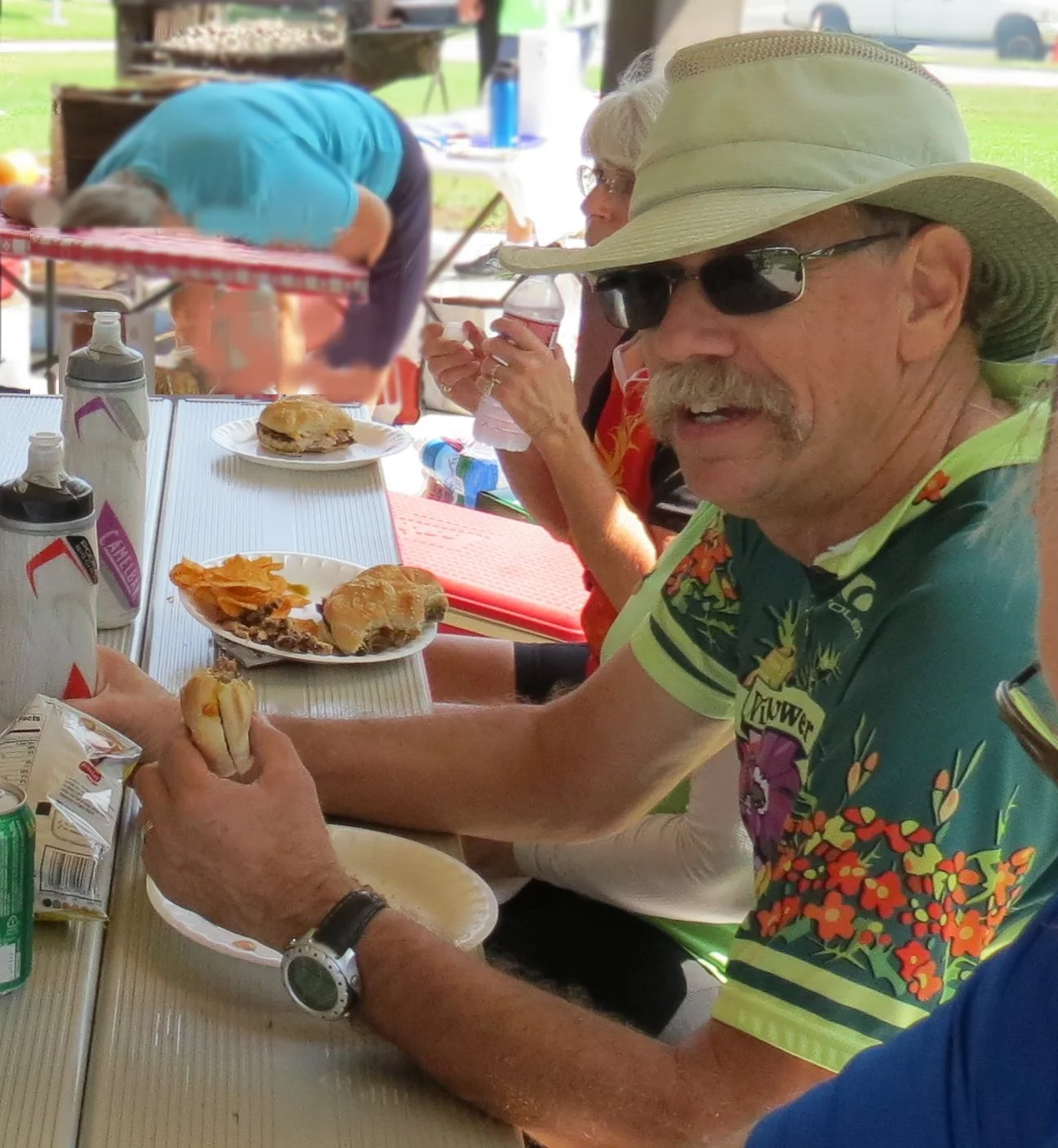 Bruce enjoying a burger at the BBQ