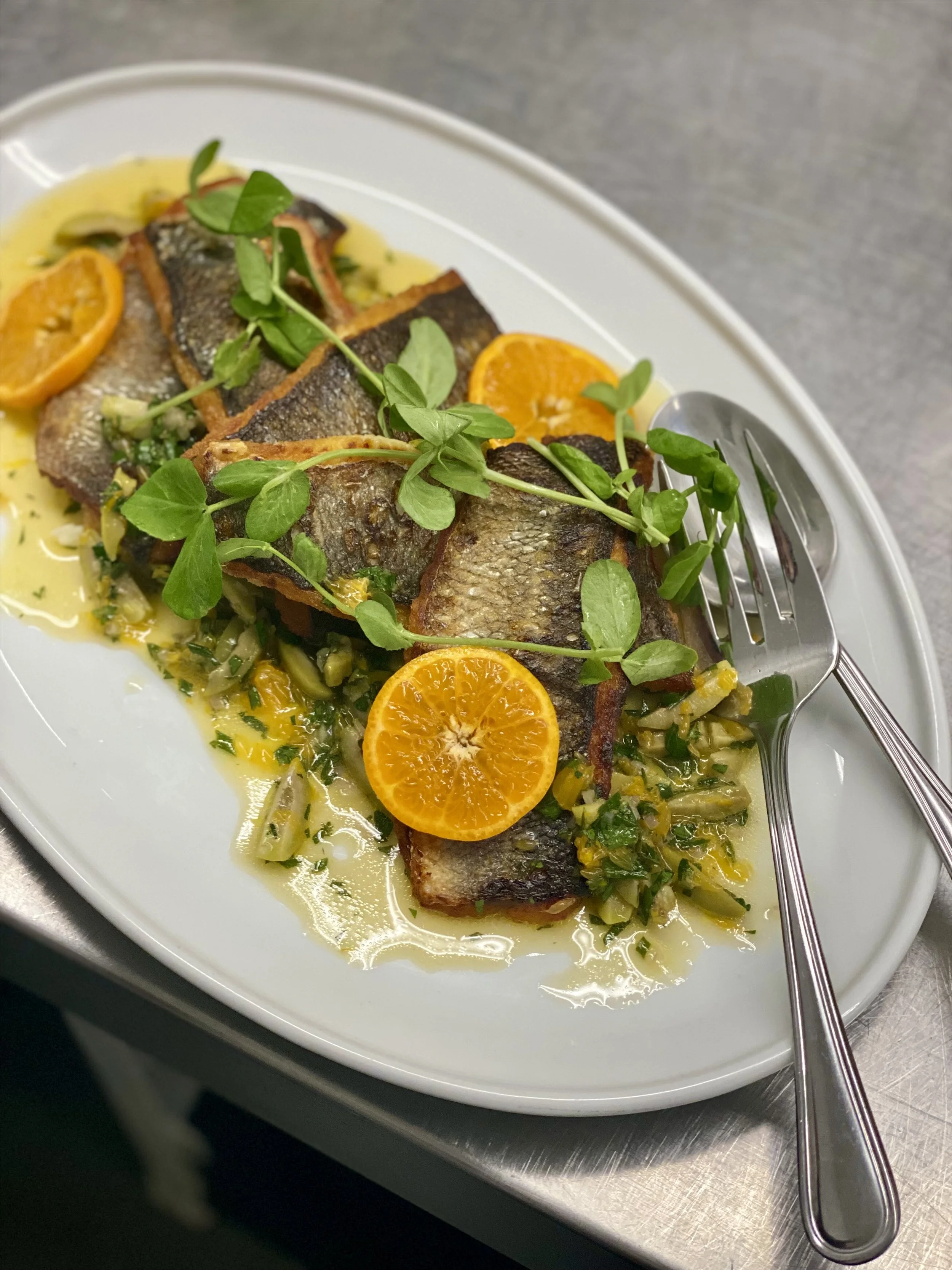 Branzino with castelvetrano olive &amp; clementine gremolata