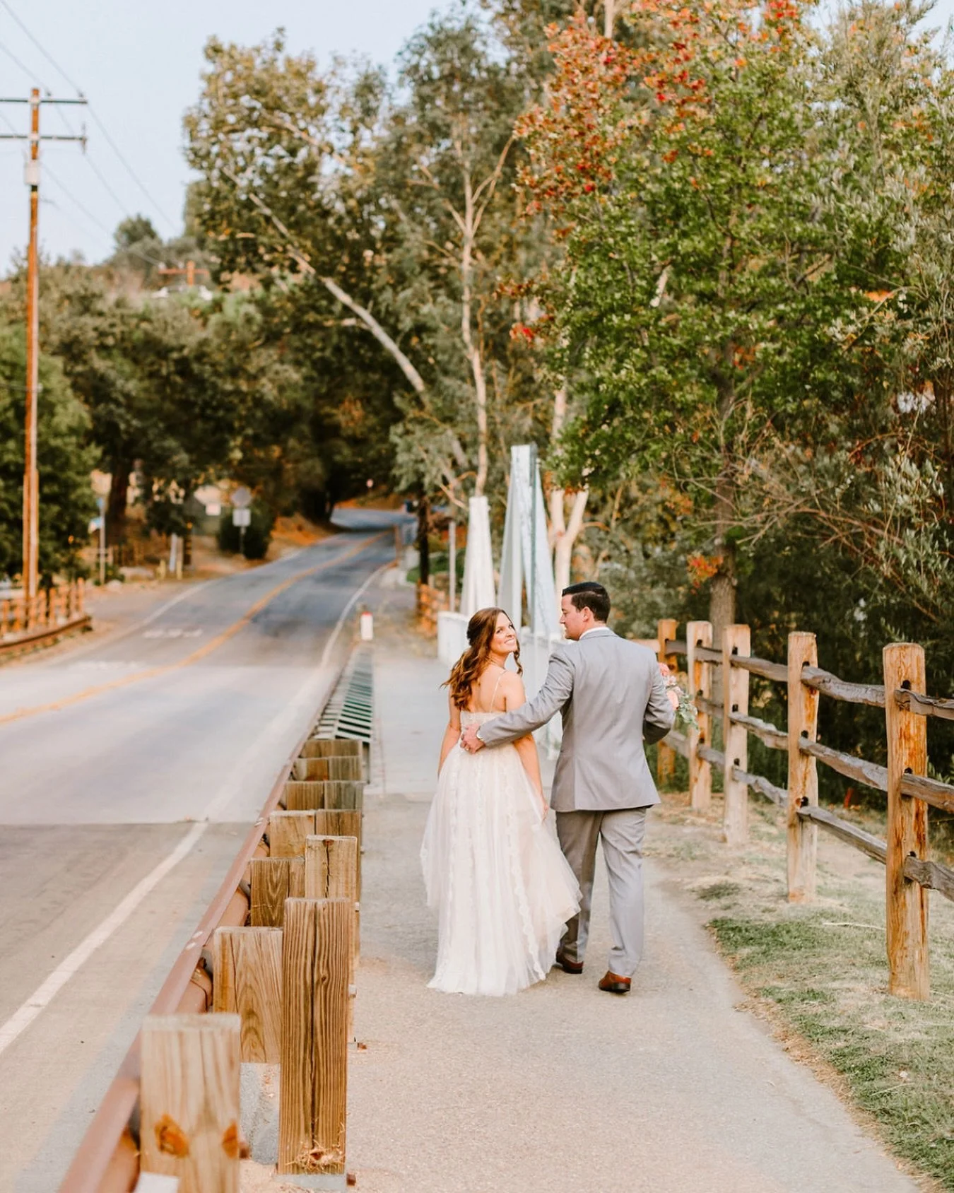 Those little moments captured after the ceremony end up being some of the best! The &ldquo;we did it&rdquo; starts to settle in, deep breaths, and the walk back together. 

This bridge has become one our couples favorites spots to grab the memories. 
