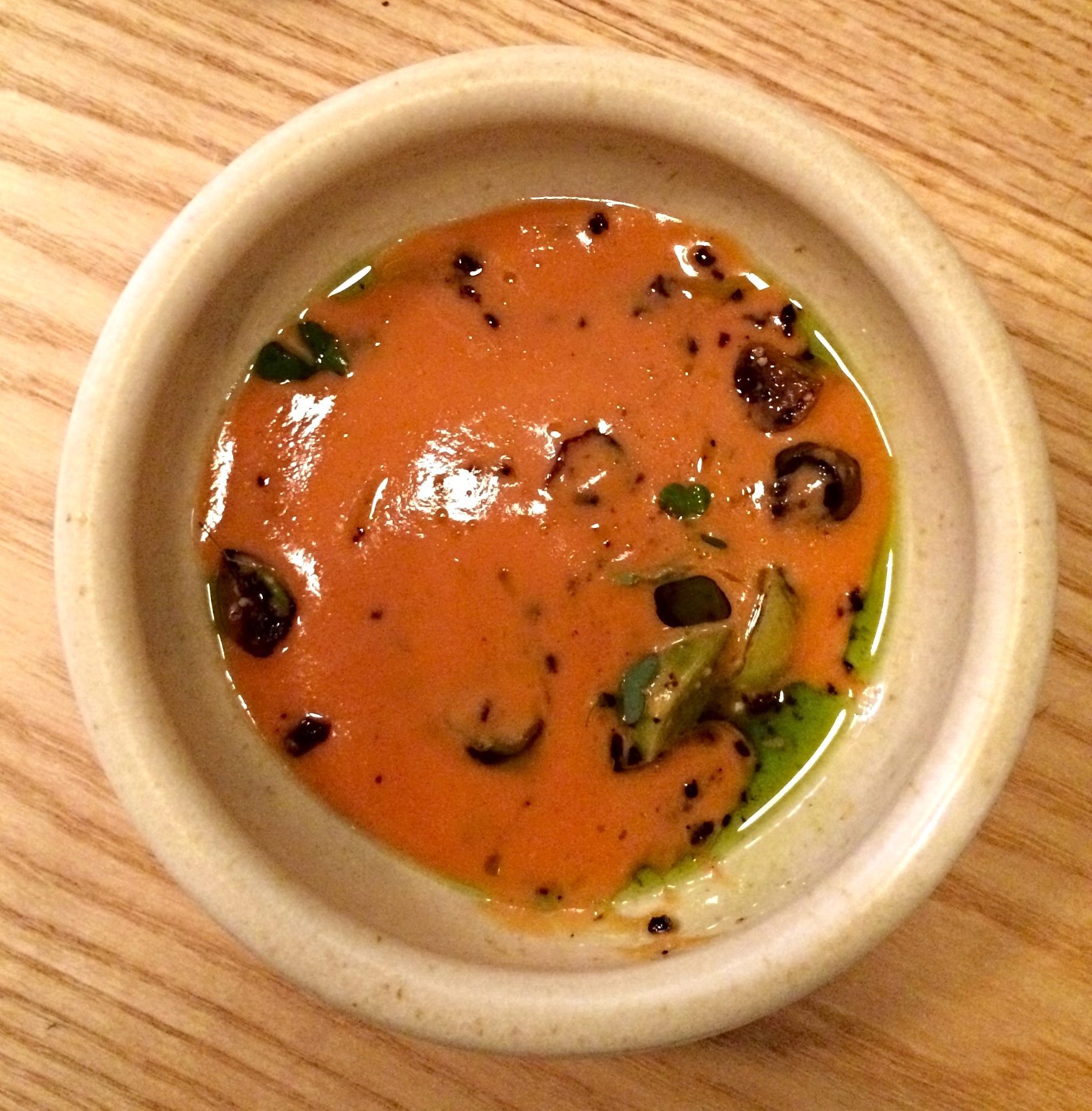 tomato gazpacho with tomatillos, husk cherries & black olives