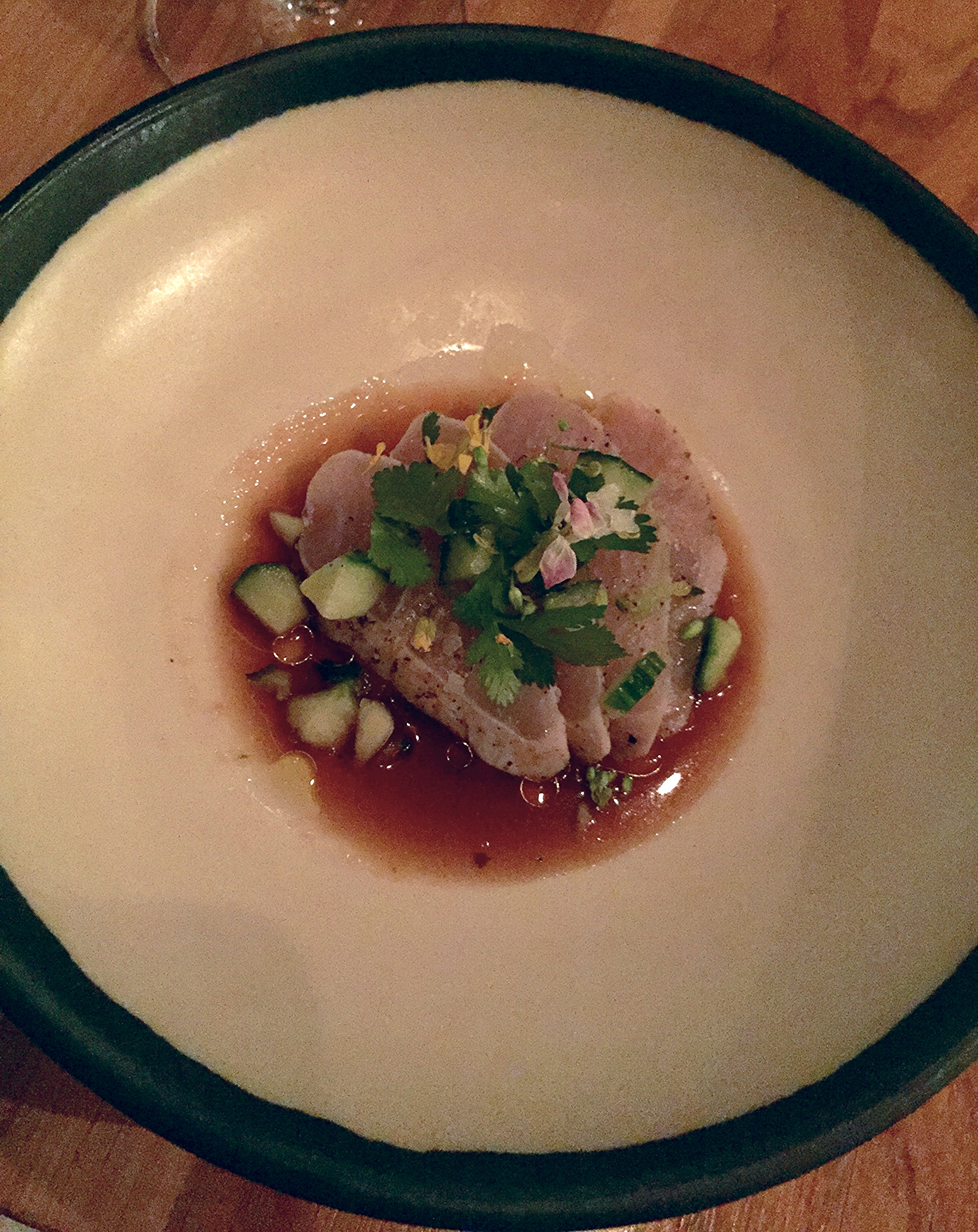 amberjack crudo, charred tomato ponzu, cucumber, black pepper, cilantro
