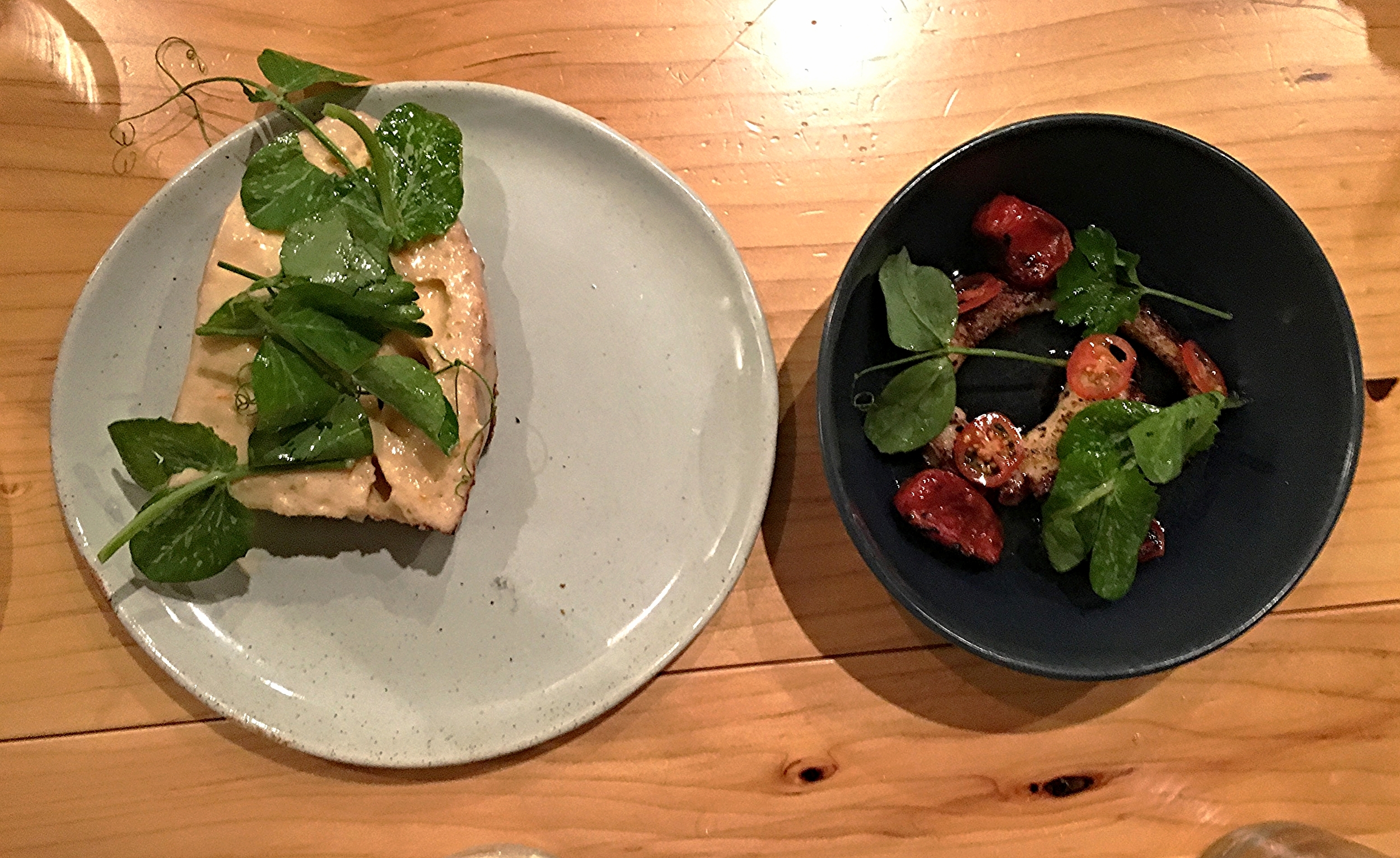 octopus, charred tomato, pea shoots, pork lardo toast