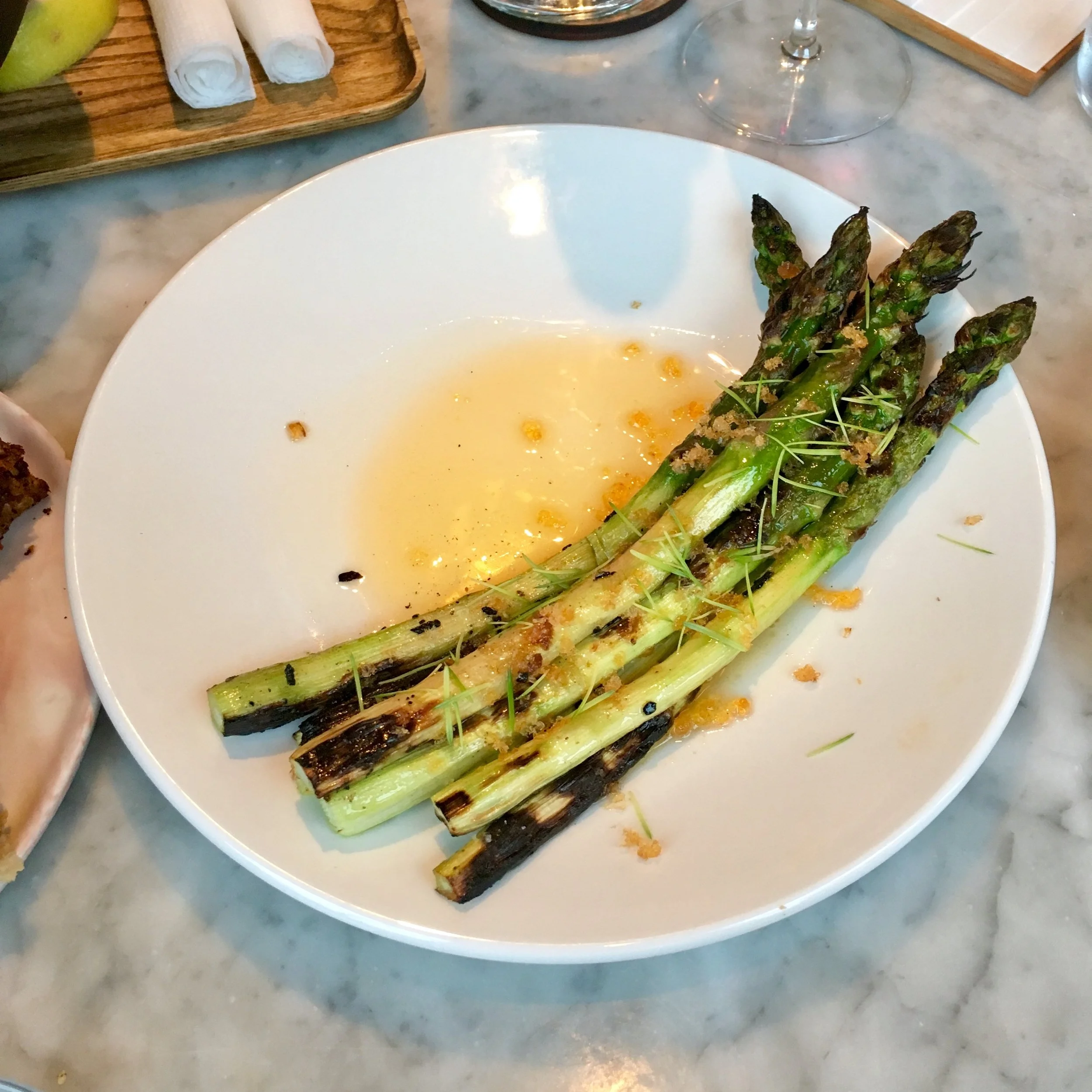 cedar grilled asparagus, lobster butter, bottarga, spruce shoots