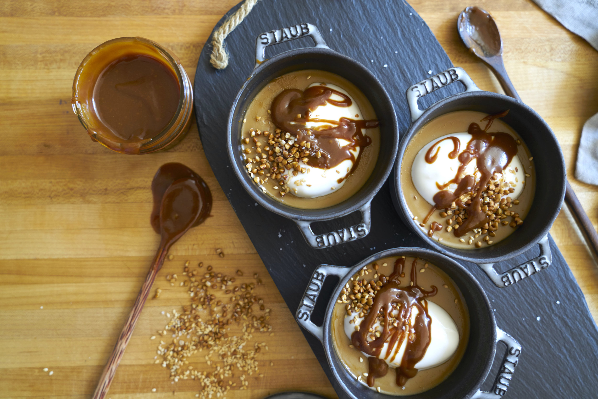 butterscotch pots de crème with salted caramel tahini sauce &amp; toasted kasha