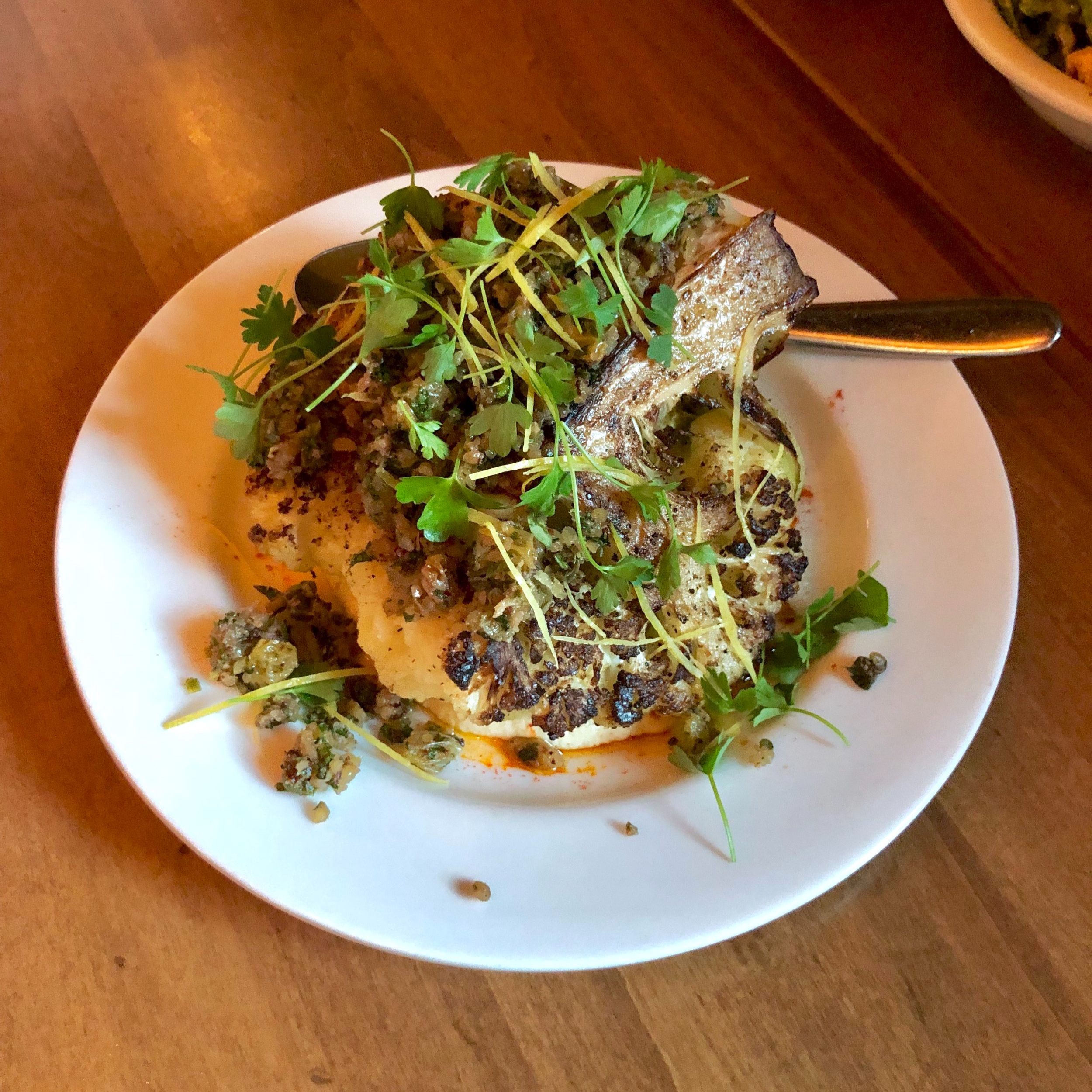 griddled cauliflower, cauliflower "tahini", walnut raisin caper relish