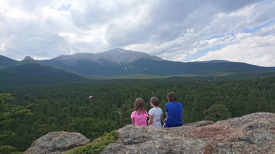 Deb's three girls enjoying the view while hiking in Colorado.