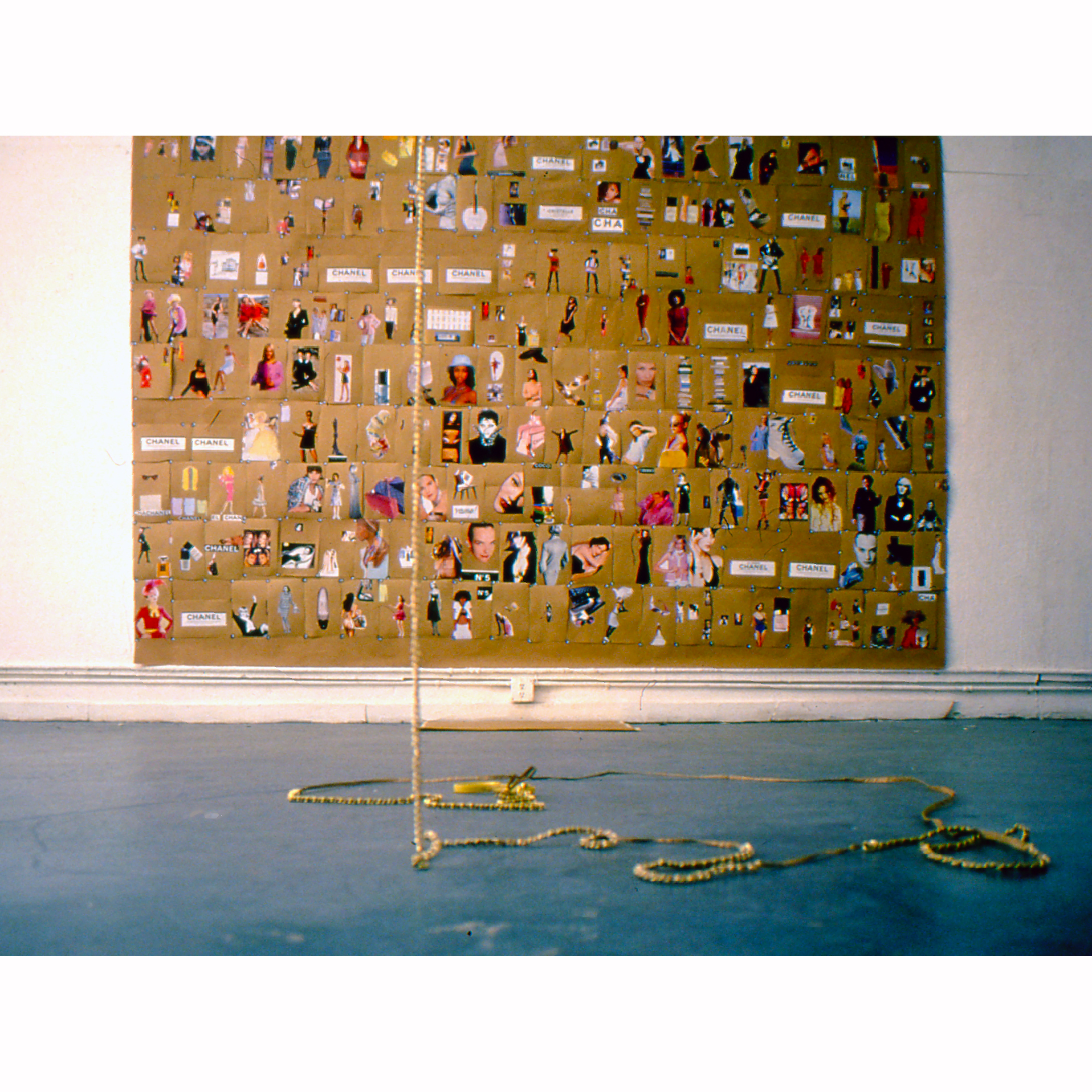 The Chain , 1996 large scale collage on paper , with brass chain and magnifying glass