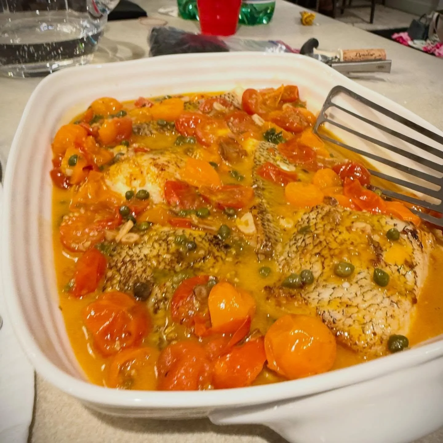 Love some Acqua pazza Chilean sea bass.

Something about dipping a big hunk of bread in white wine and butter and tomatoes just makes me smile. 😊