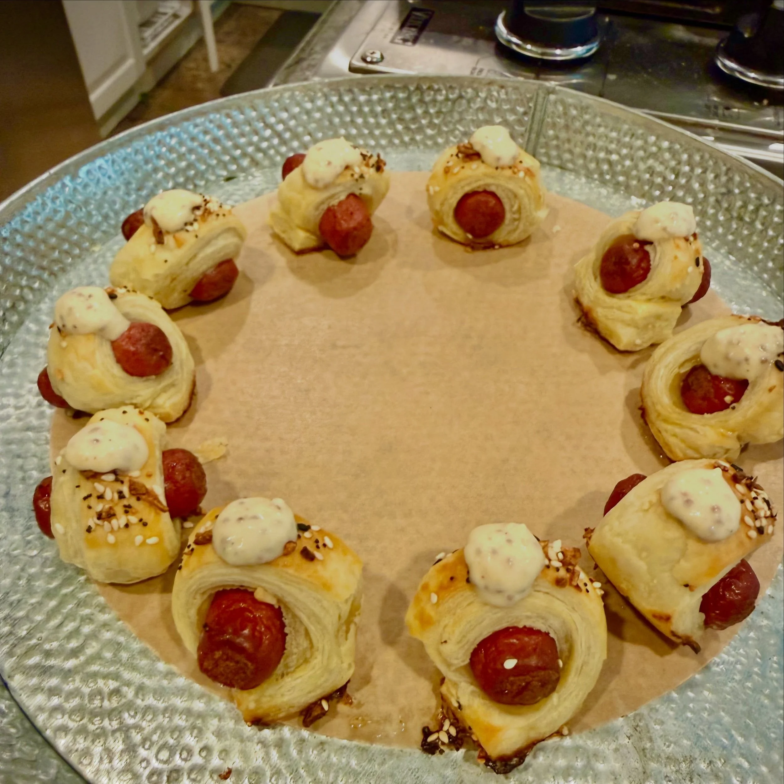 Pigs in a blanket, EDF style. ✨

Puff pastry, egg washed with Parmesan everything bagel seasoning. Topped with whole grain mustard cr&egrave;me fra&icirc;che. Don&rsquo;t mess the classics (much) sometimes. They&rsquo;re classic for a reason.

Eat Da