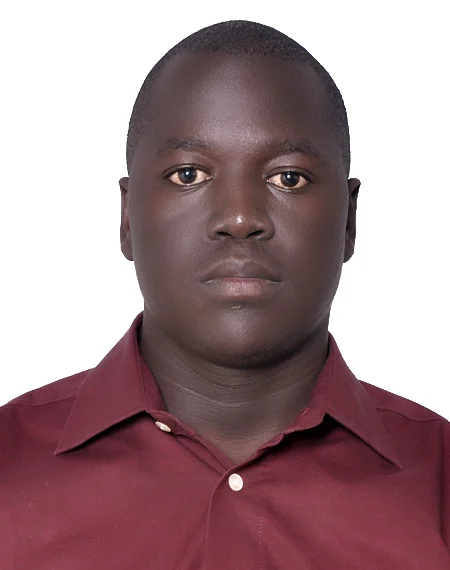 John is training at Kampala International University, Uganda