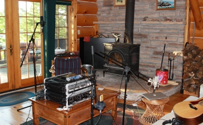A recording session for Come a Little Closer at the log cabin
