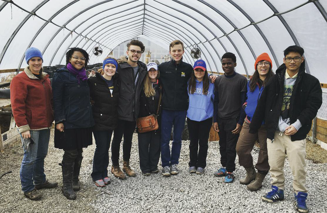 Volunteers from Canisius College at the Massachusetts Avenue Project, an organization that promotes community and sustainability on the West Side of Buffalo, NY.