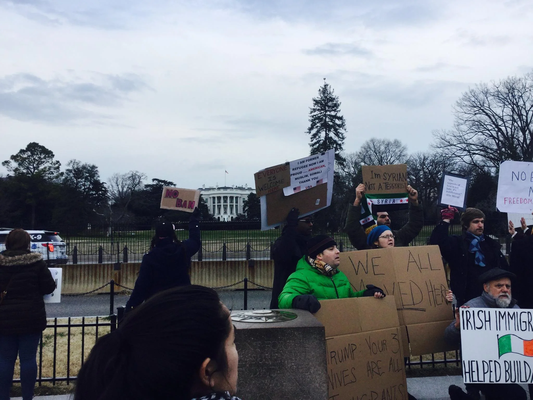 Hundreds of protesters gathered in Washington, DC, and marched around the White House and down Pennslyvania Avenue NW towards the Trump International Hotel. Photo courtesy of Lucas Sharma, SJ. 