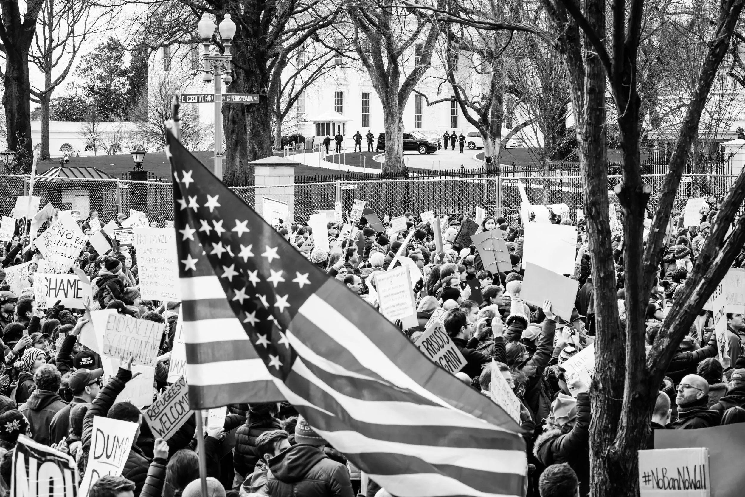 Protesters outside The White House stand up against Trump's Executive Order. Photo Courtesy of Geoff Livingston of the Flickr Creative Commons. 